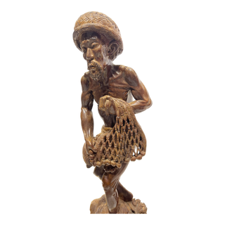 Wooden Fisherman Sculpture